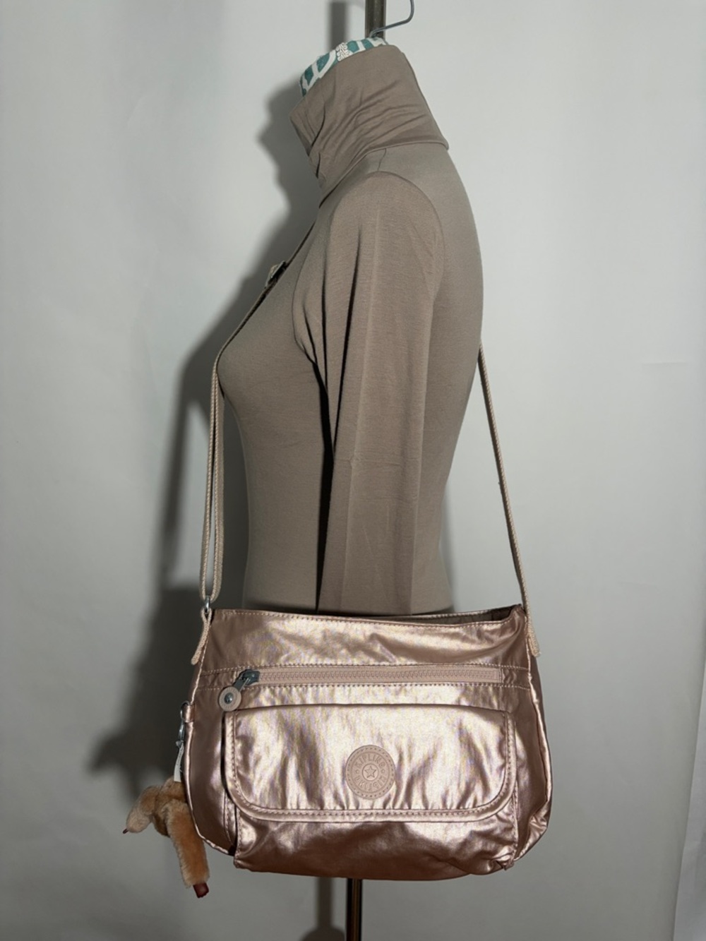 Kipling Syro Rose Gold Metallic Convertible Crossbody Bag With Monkey Charm